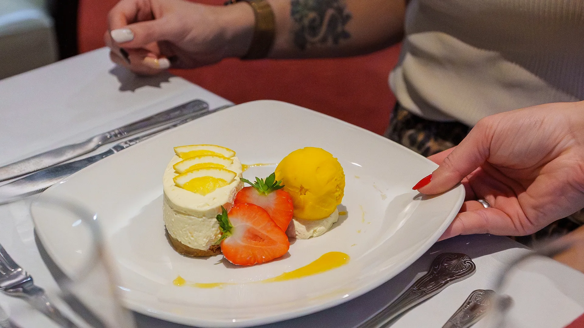 A stunning lemon cheesecake and accompaniments at Arden Hotel Restaurant. 