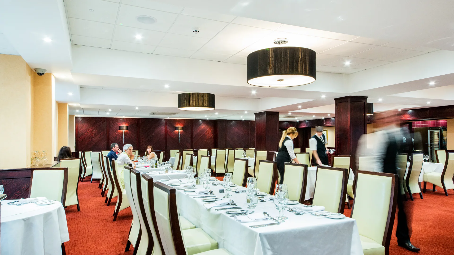 The elegant dining area of the Arden Hotel Restaurant.