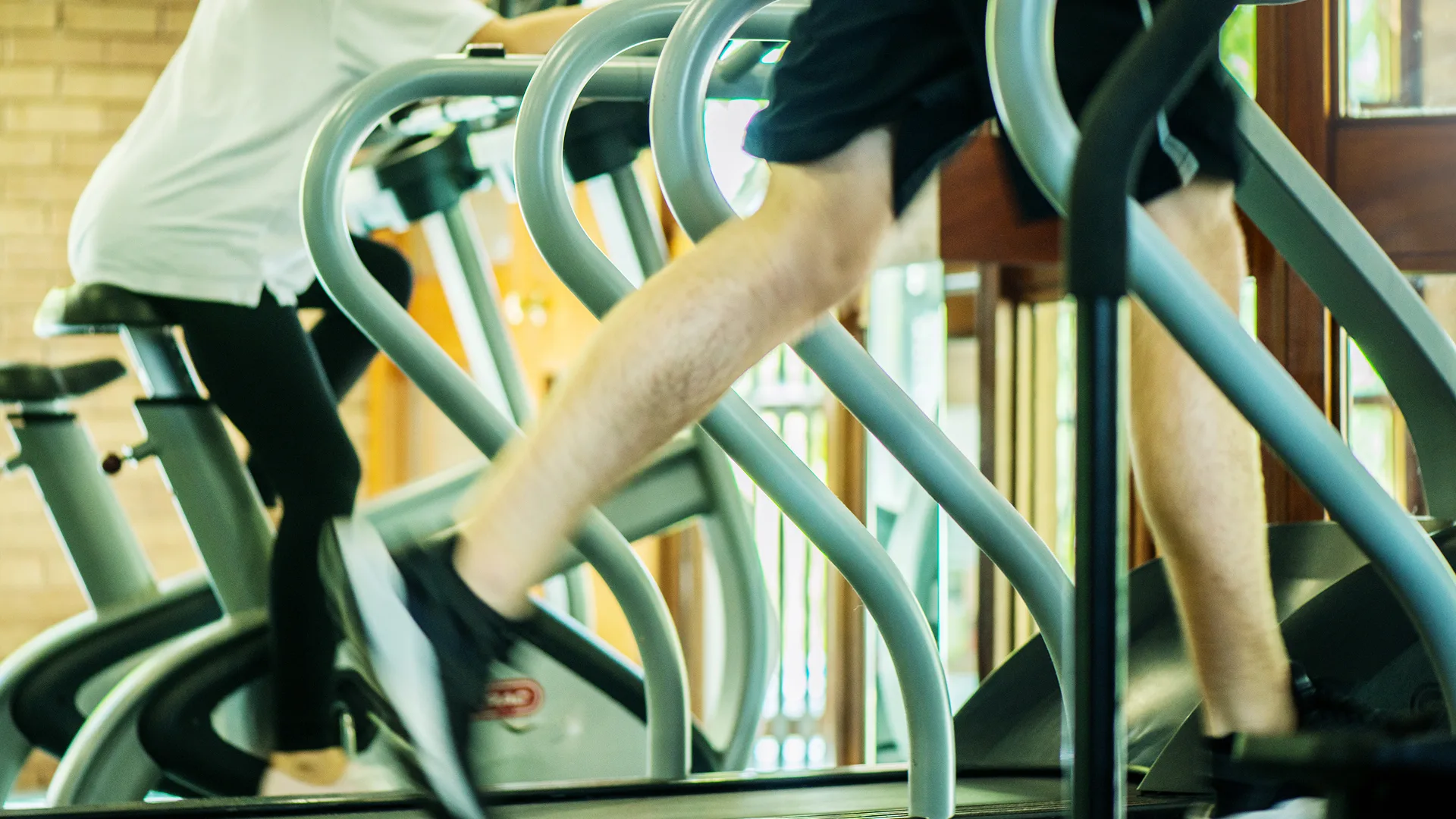 A guest running on a treadmill.