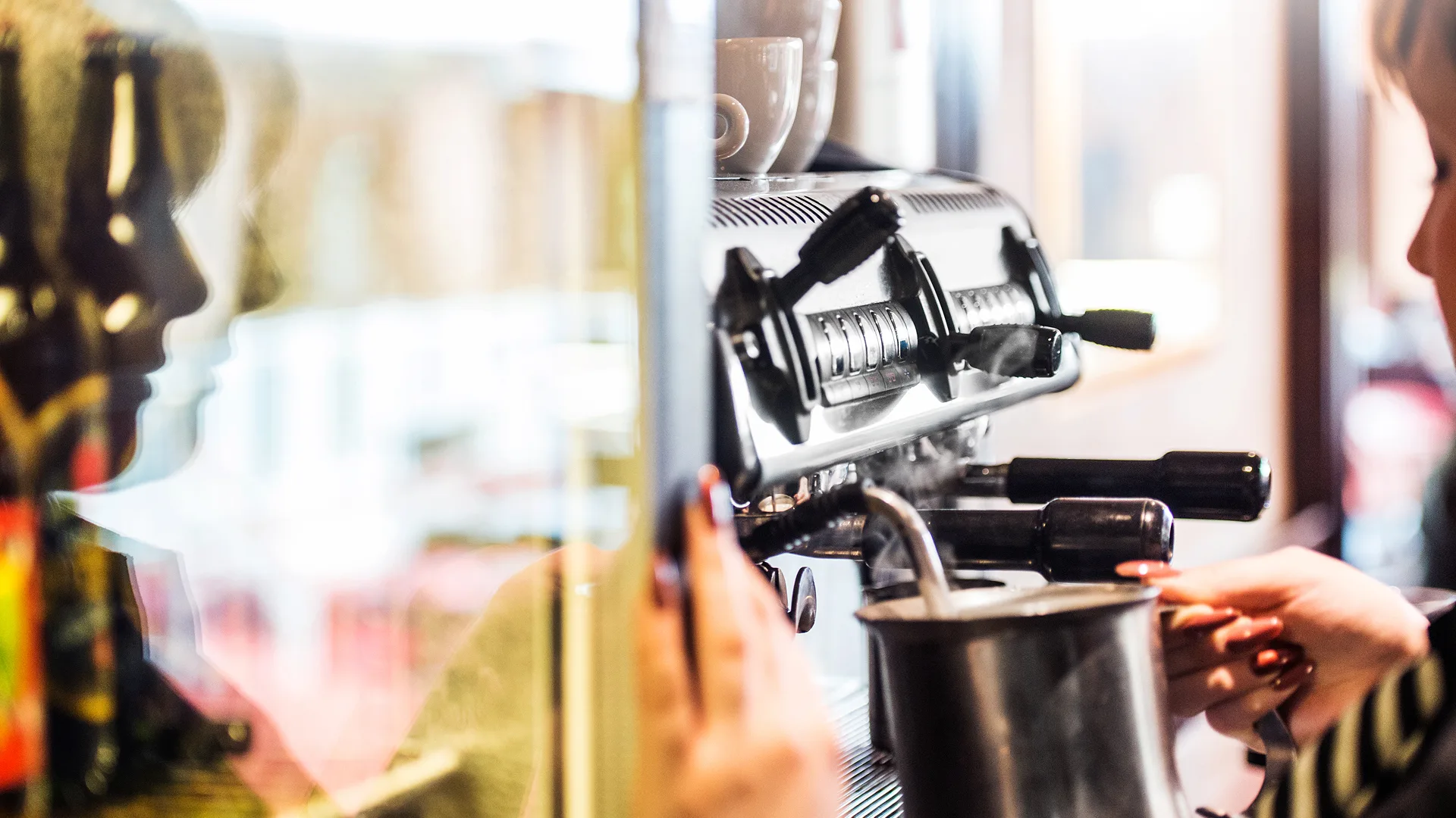Frothing milk for coffees. 
