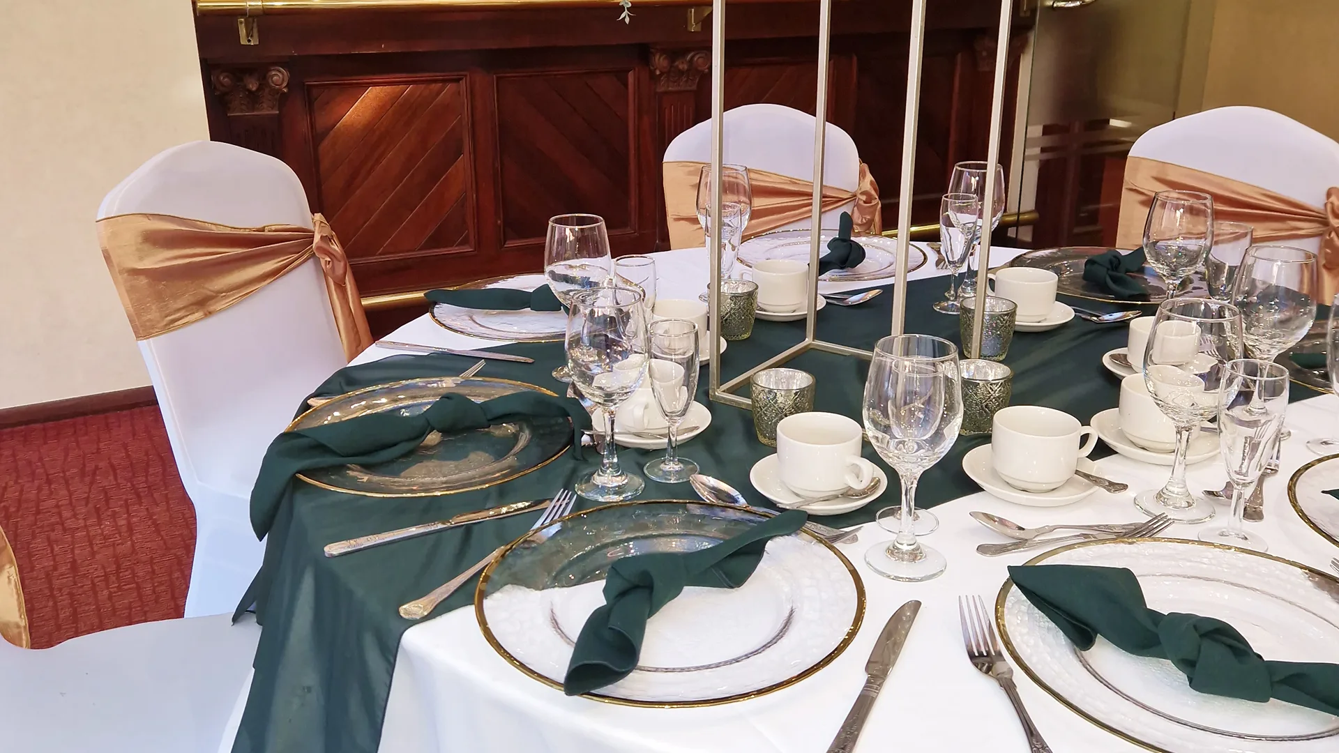 Elegant table settings for a wedding reception.