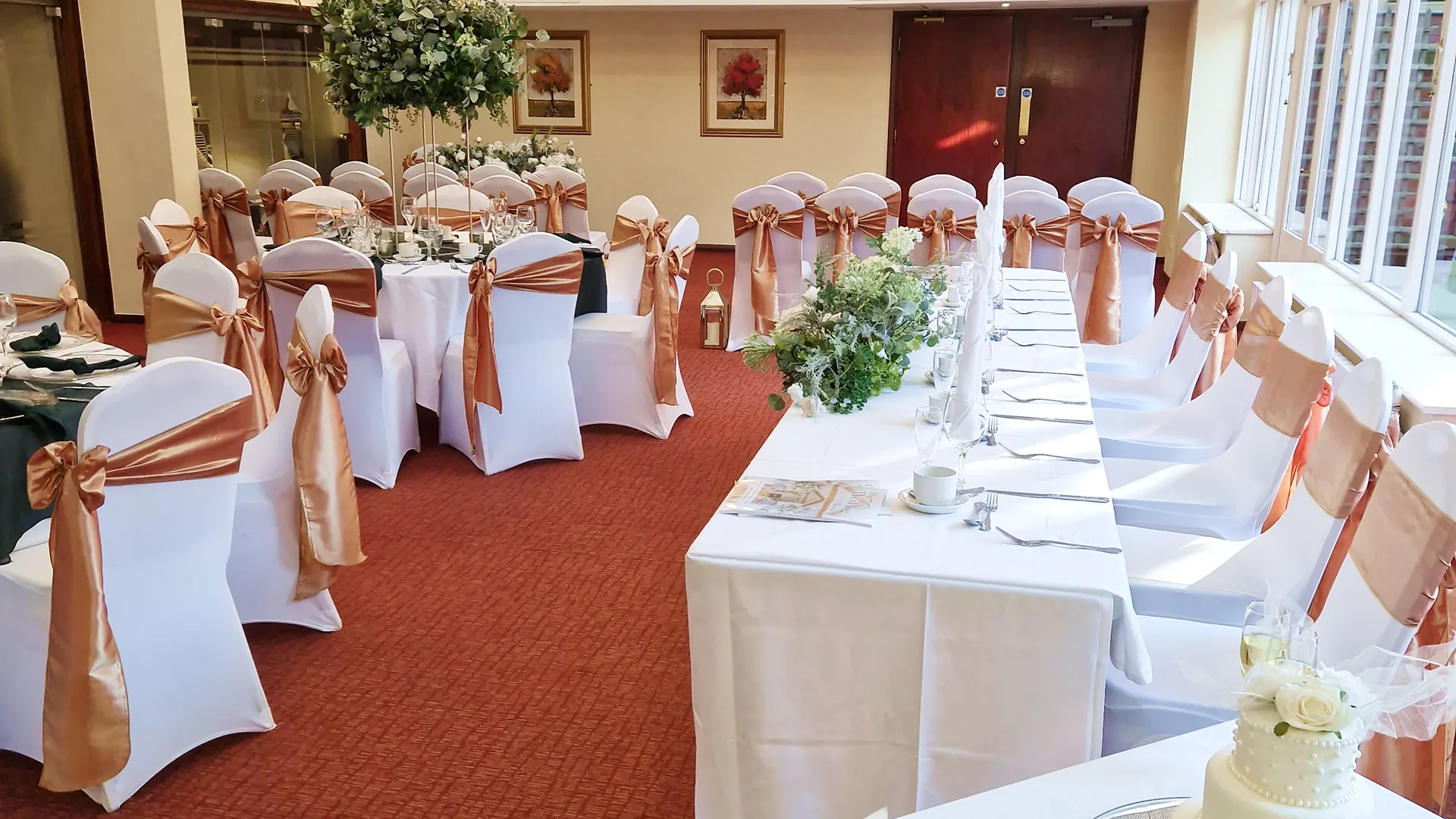 A wedding reception room all set up and waiting for the celebration to begin.